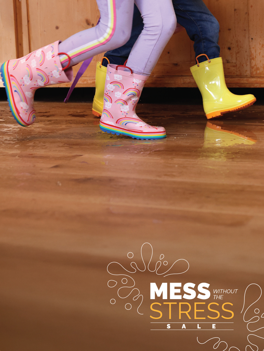 Dad dancing on newly installed hardwood flooring by Flooring America